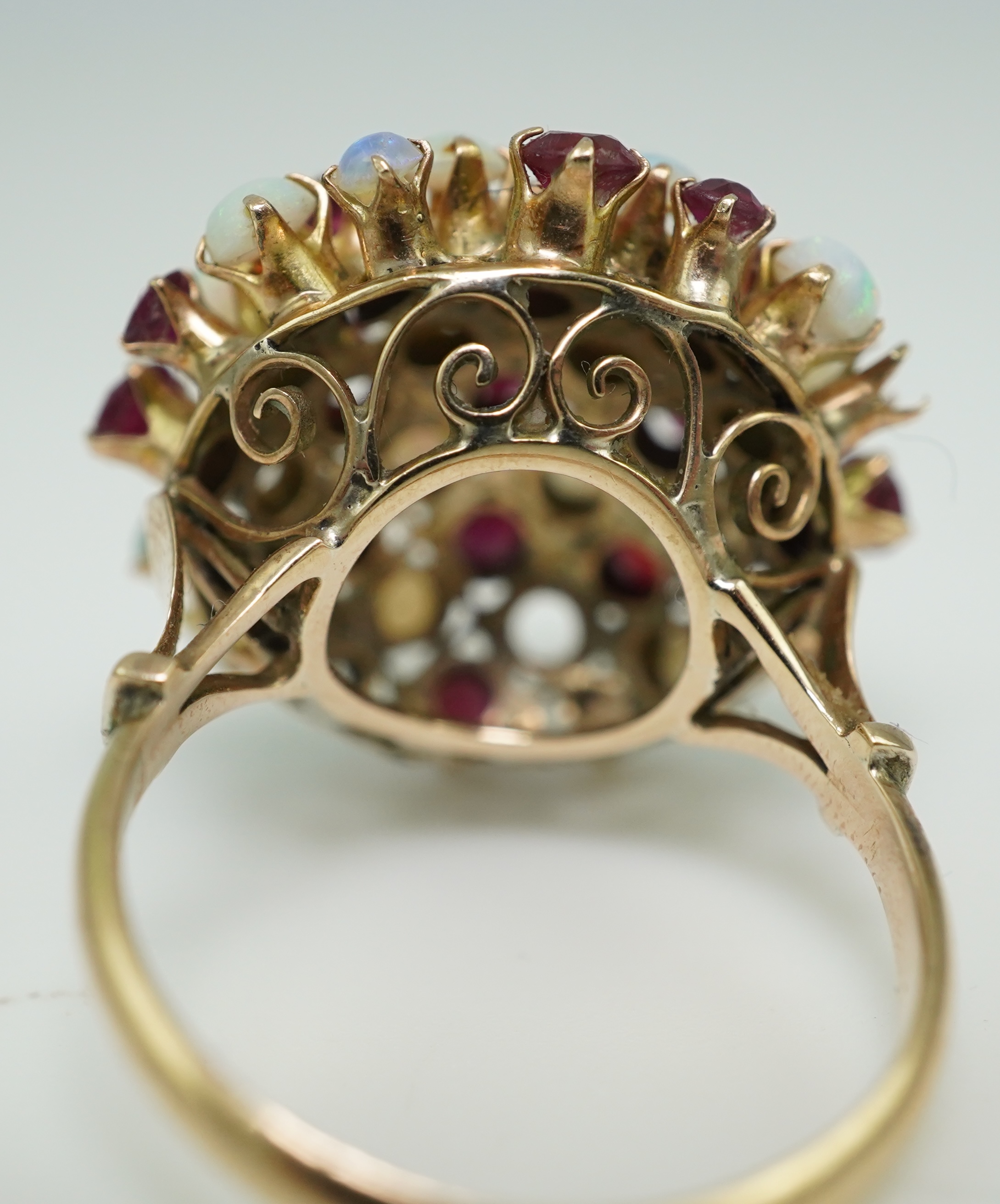 A ruby and opal cocktail ring, mid 20th century